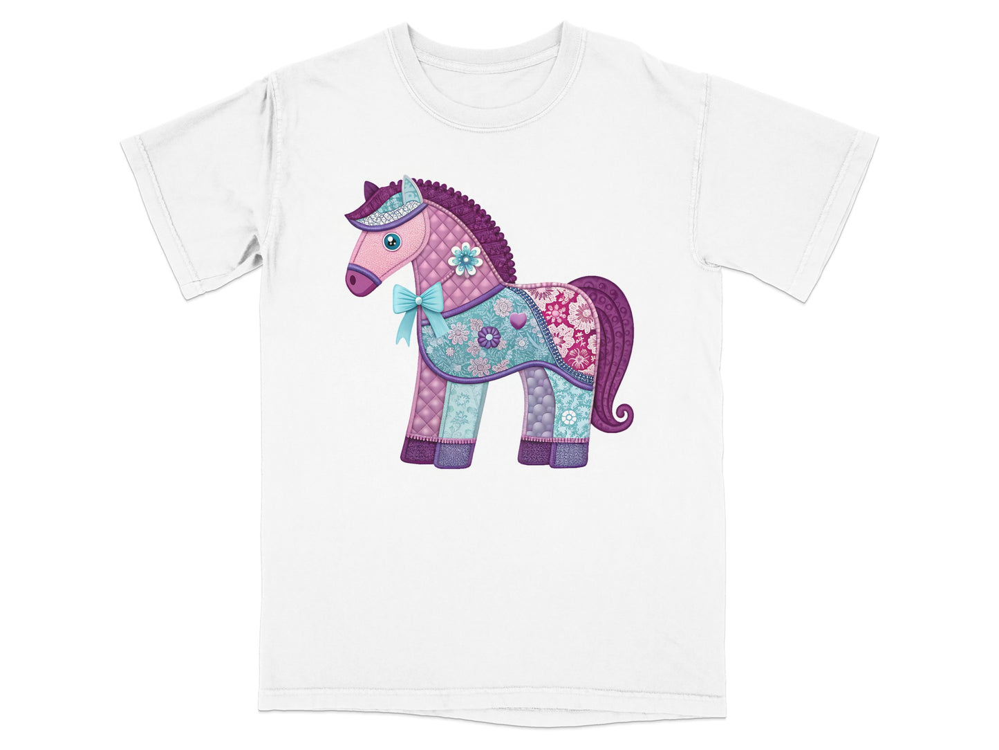 Quilted horse with floral patterns and a blue bow on a white t-shirt.