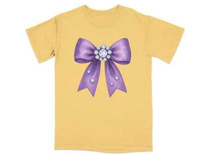Yellow t-shirt with a watercolor purple bow with rhinestones.