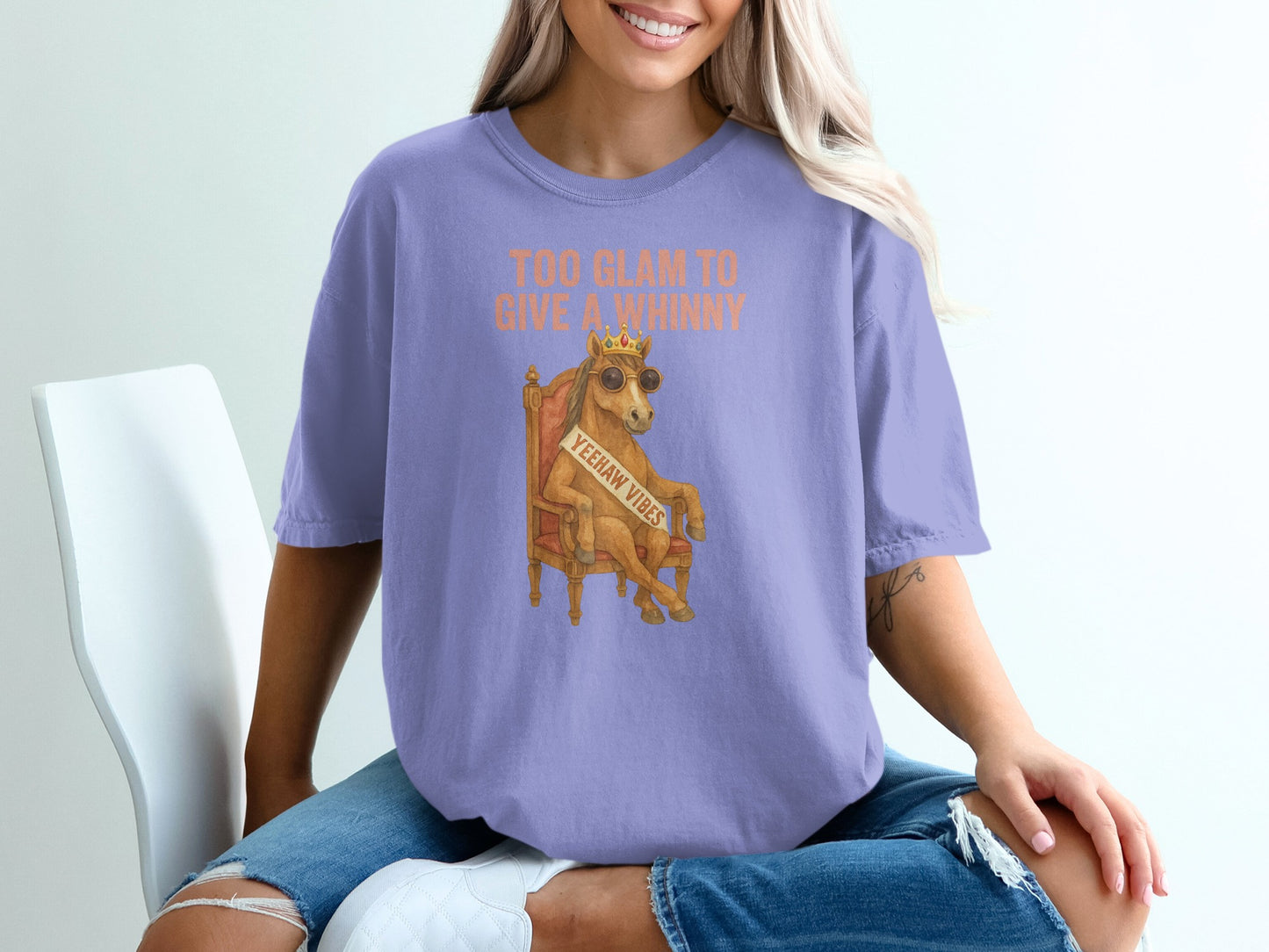 Purple t-shirt with "Too Glam to Give a Whinny" and "Yeehaw Vibes".