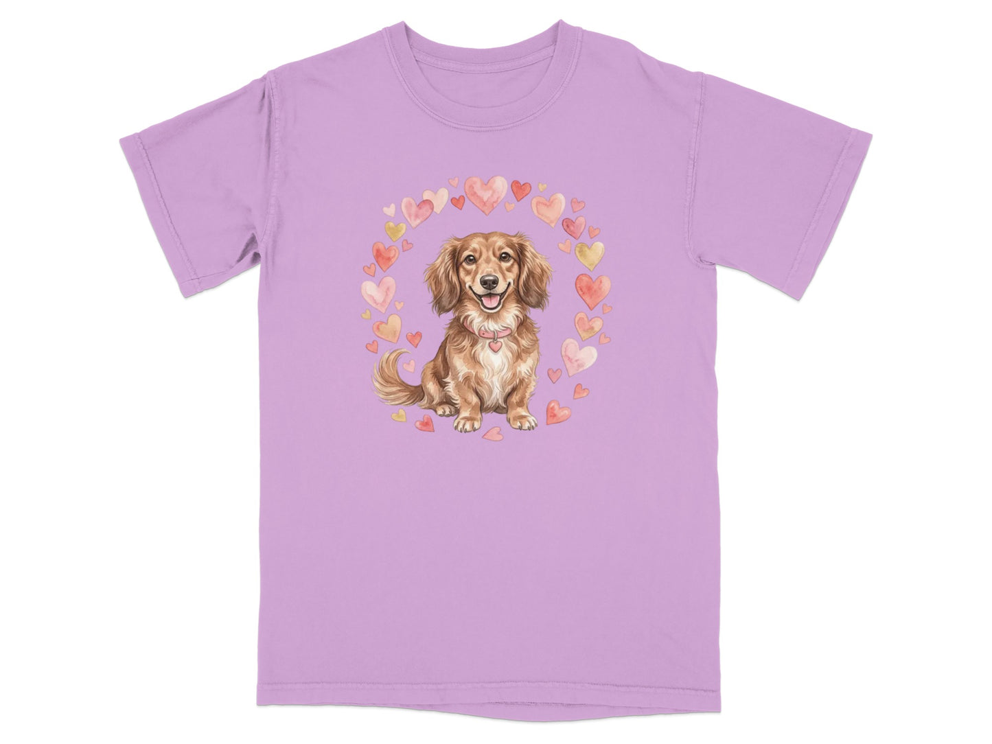 Dachshund wearing a heart collar, surrounded by a heart wreath on a lilac t-shirt.