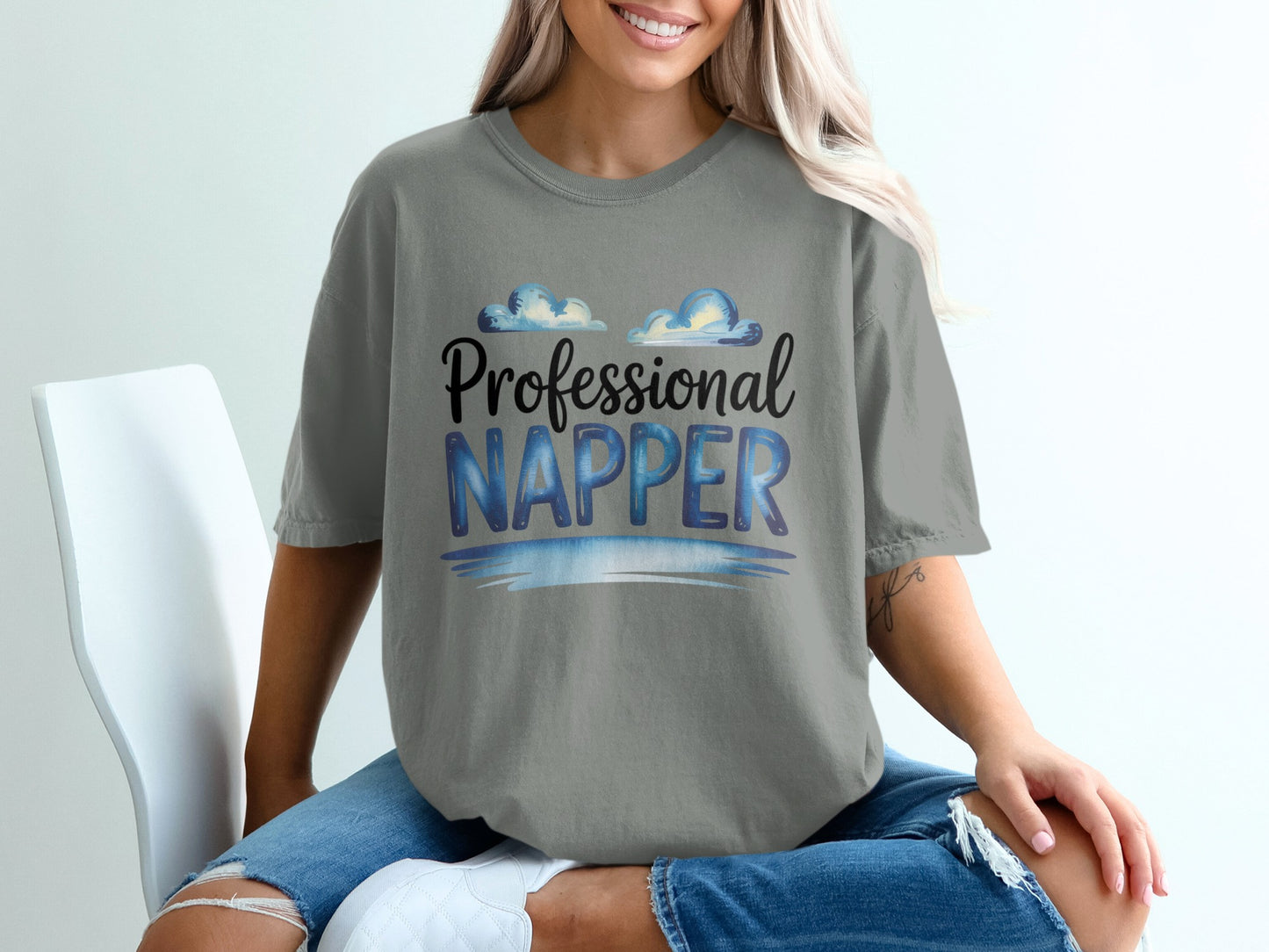Gray t-shirt with "Professional Napper" text and cloud design.