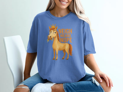 Blue t-shirt with a cartoon horse wearing a crown and the text "NEIGH MEANS HOPE".