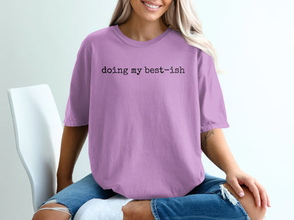 Lavender t-shirt with "doing my best-ish" text on the chest.