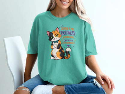 T-shirt with a cartoon cat saying "Sorry if my boldness offends you... (not really, I'm adorable)".