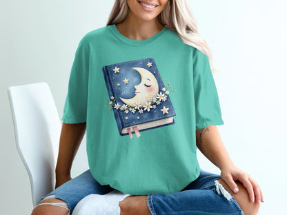 Book with smiling moon and stars on cover, surrounded by flowers.