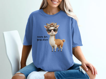 Blue t-shirt with cartoon llama wearing sunglasses and bandana.