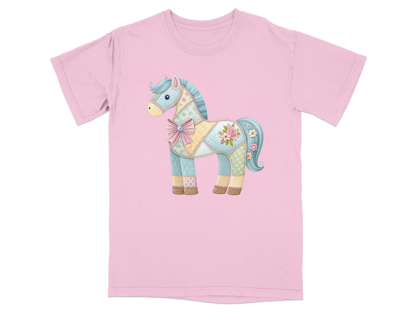 Pink t-shirt with a patchwork horse graphic featuring floral patterns and a bow.