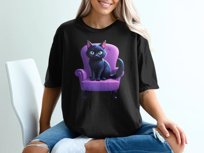 Black t-shirt featuring a cartoon black cat sitting on a purple chair.