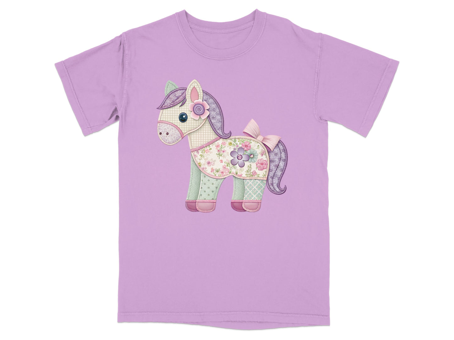 Purple t-shirt with a patchwork horse design featuring flowers and a bow.
