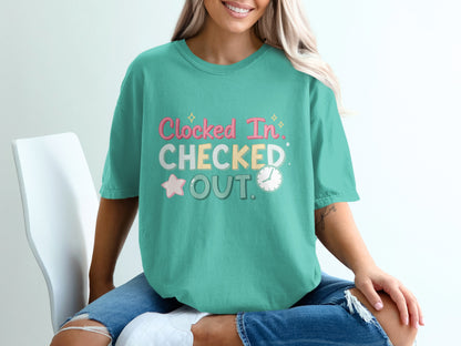 Teal t-shirt with "Clocked In. Checked Out." text and clock graphic.