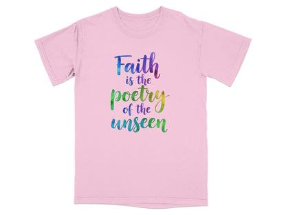 Pink t-shirt with "Faith is the poetry of the unseen" in colorful watercolor text.
