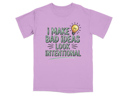 Purple t-shirt with text "I MAKE BAD IDEAS LOOK INTENTIONAL" and a lightbulb.