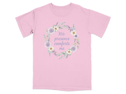 Pink t-shirt with "His presence comforts me" inside floral wreath.