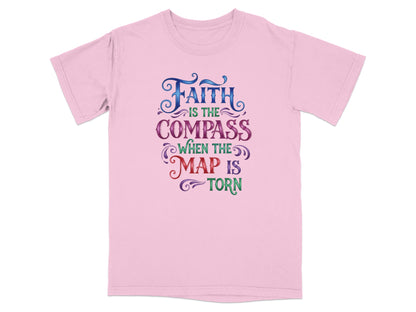 Pink t-shirt with "Faith is the compass when the map is torn" text.