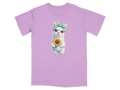 Lilac t-shirt featuring a cartoon llama wearing a green bandana holding a sunflower.