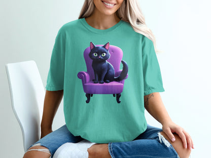 Black cat with green eyes sitting on a purple chair.