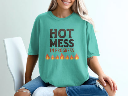 Teal t-shirt with "HOT MESS IN PROGRESS" and cartoon flames.