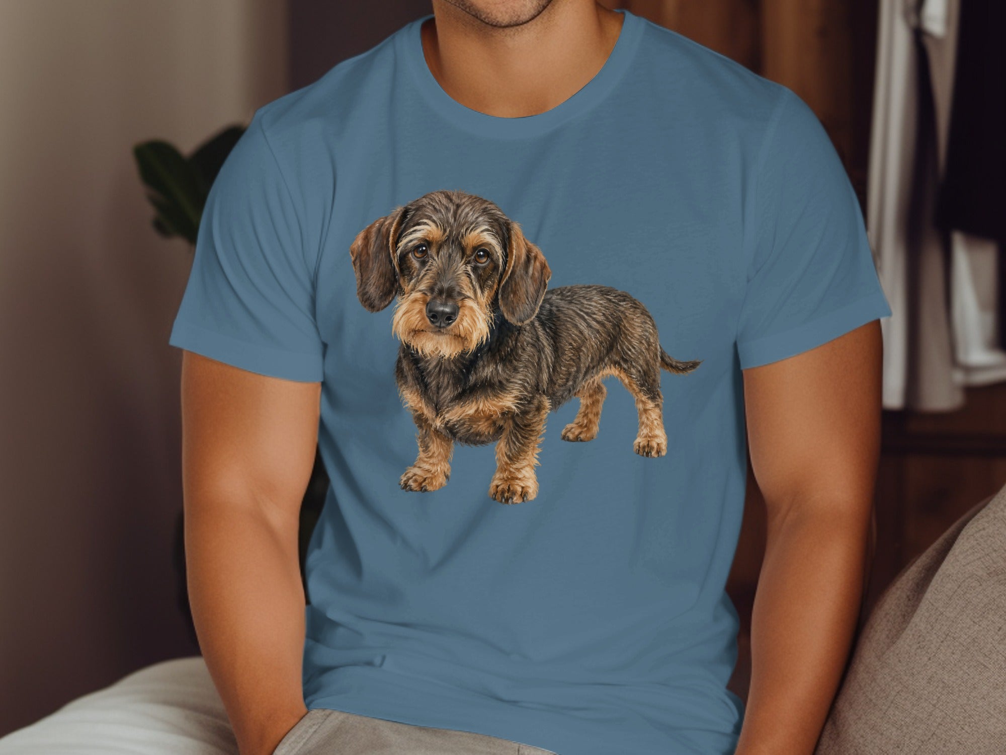T-shirt with a print of a brown wirehaired dachshund standing.