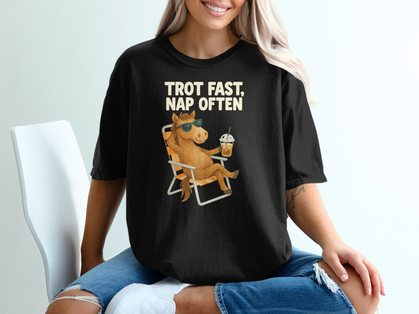 Black t-shirt with "Trot Fast, Nap Often" text and a cartoon horse.