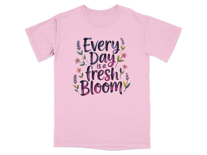 Pink t-shirt with "Everyday is a fresh Bloom" text and floral accents.
