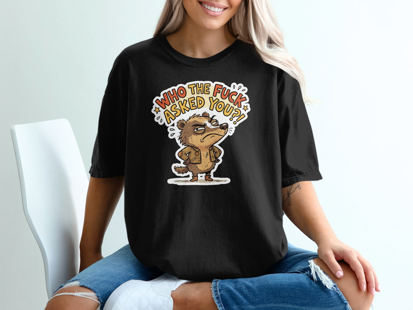 Black t-shirt with cartoon badger saying "Who the f*ck asked you?".