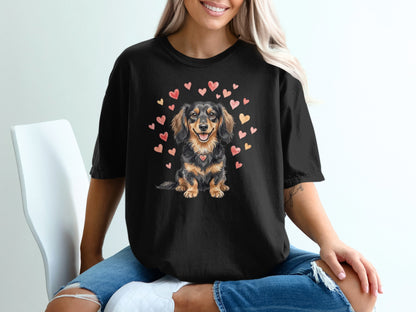 Black t-shirt with dachshund surrounded by pink and red hearts.