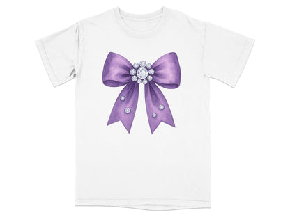 White t-shirt with a purple bow embellished with rhinestones.