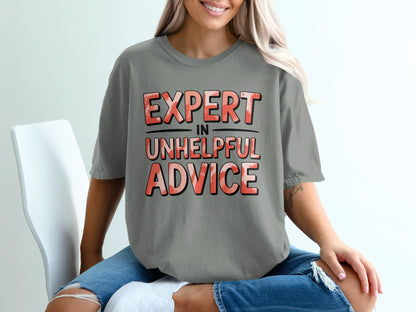 Gray t-shirt with "EXPERT IN UNHELPFUL ADVICE" printed in red and white lettering.