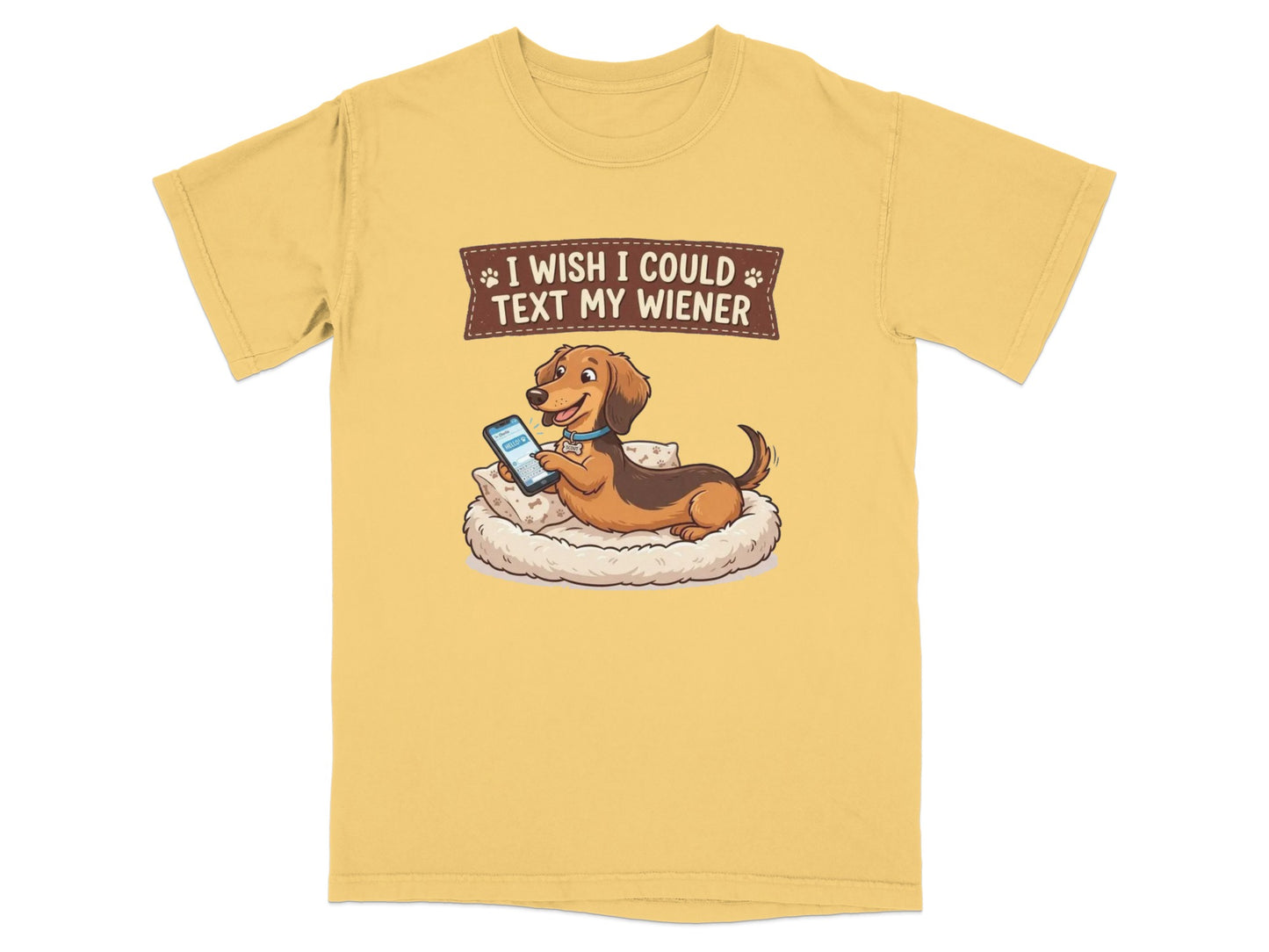 T-shirt with cartoon dachshund texting on a phone in bed.