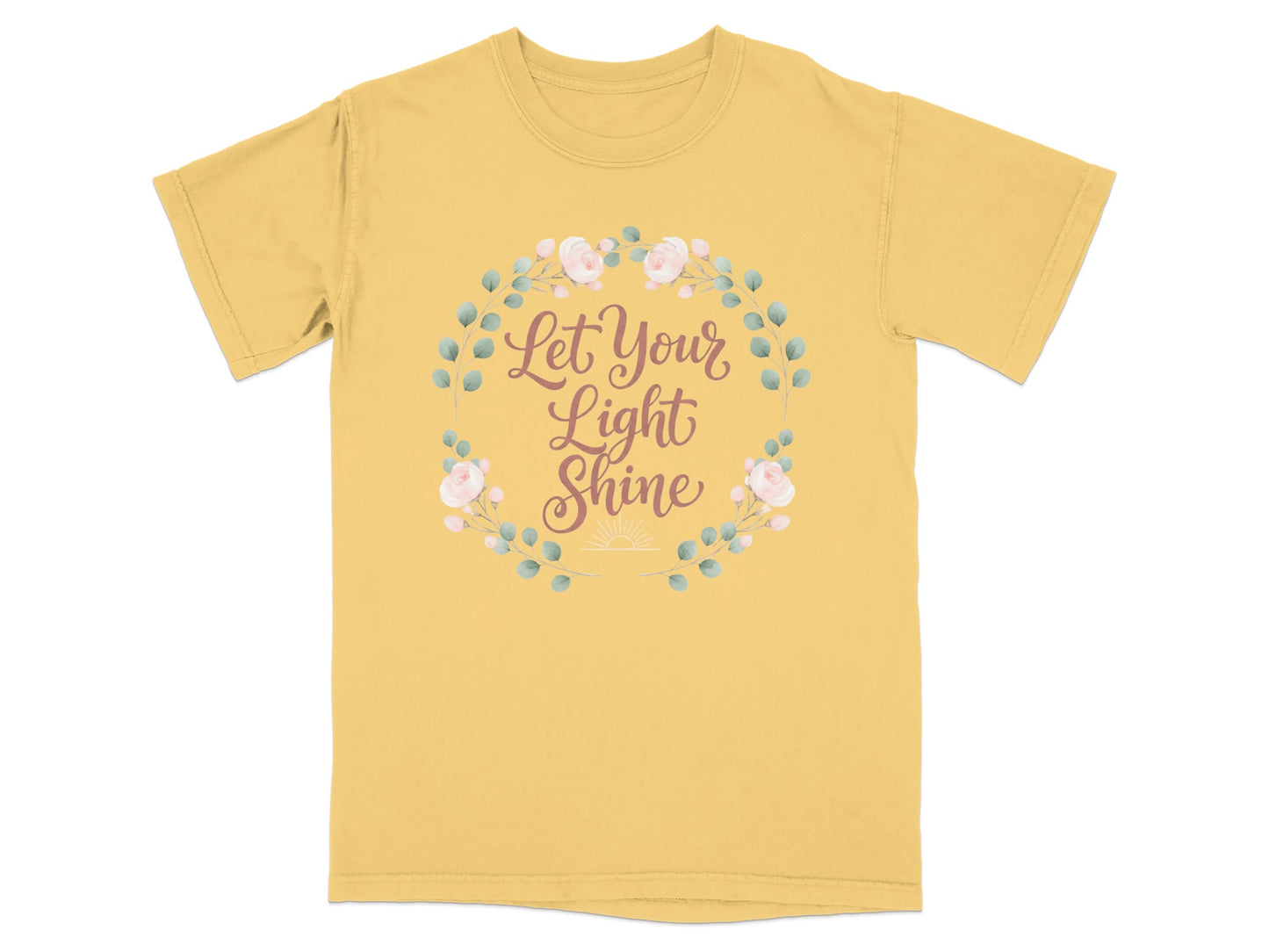 Yellow t-shirt with "Let Your Light Shine" text inside floral wreath.