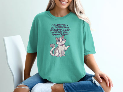 Teal t-shirt with a sassy cartoon cat and text.