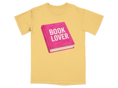 Yellow t-shirt with pink book graphic and "BOOK LOVER" text.