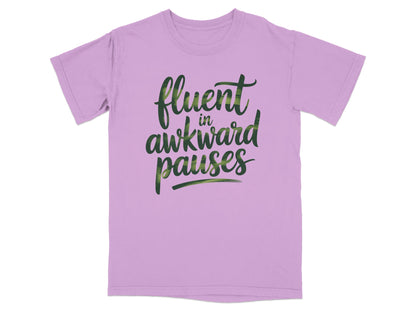Light purple t-shirt with "fluent in awkward pauses" text in green wavy font.