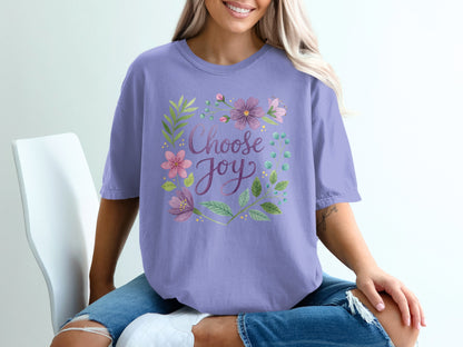 Purple t-shirt with "Choose Joy" text and floral design.