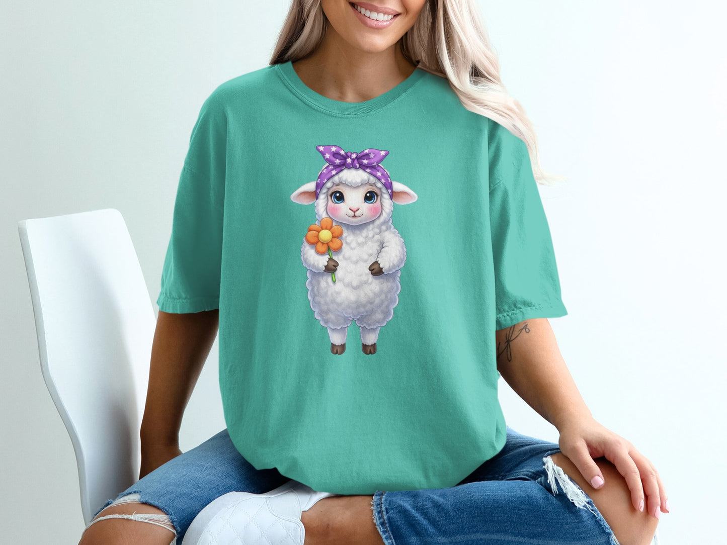 Cute cartoon sheep wearing a purple bandana and holding an orange flower.