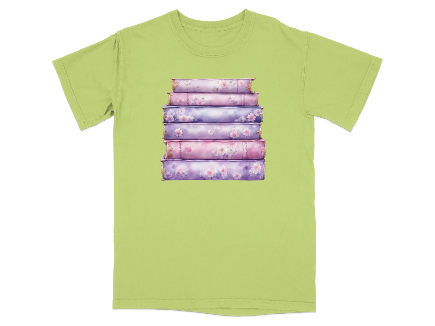 Stack of floral pattern books on a light green t-shirt.