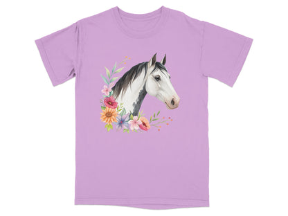 Lilac t-shirt with a watercolor painting of a horse's head surrounded by flowers.