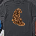 Long-haired dapple dachshund dog illustration on a dark grey t-shirt.