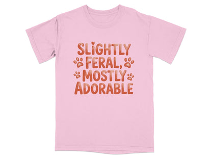Pink t-shirt with "Slightly Feral, Mostly Adorable" text.