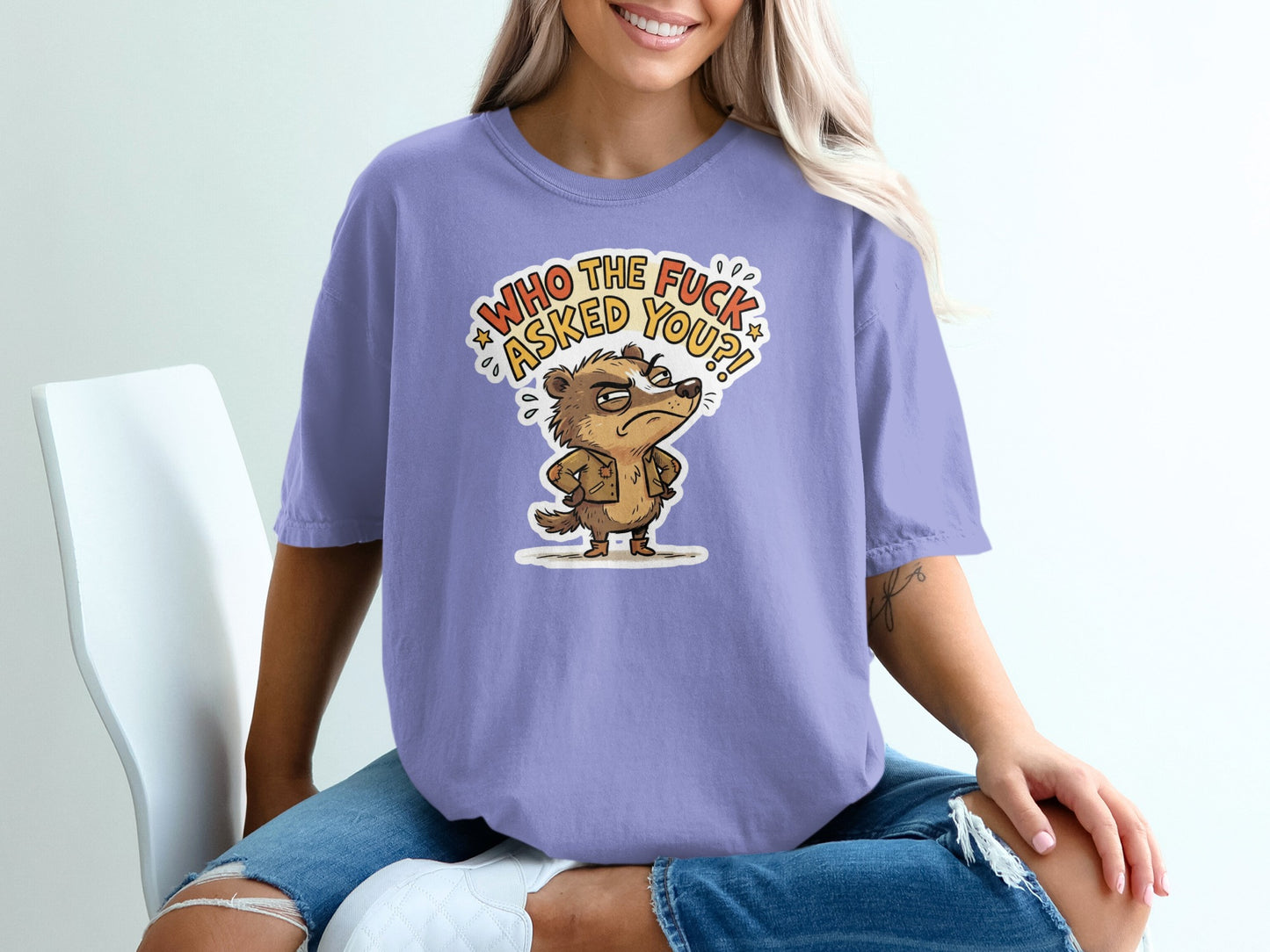 T-shirt with cartoon badger saying "Who the fuck asked you?"