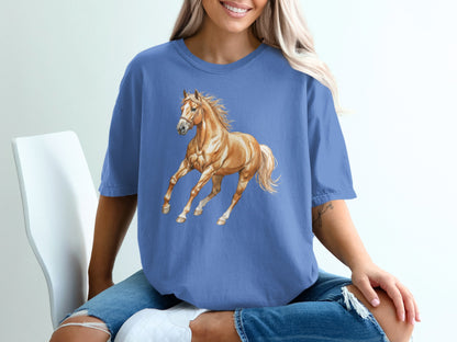 Blue t-shirt with a watercolor painting of a running horse.
