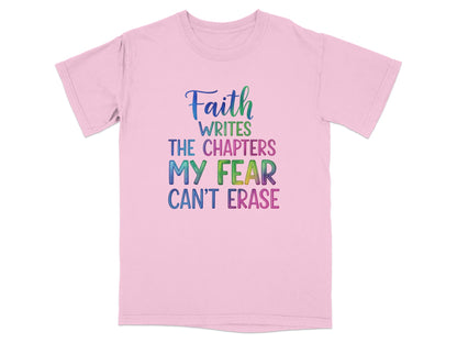 Pink t-shirt with "Faith Writes My Fear Can't Erase" text.