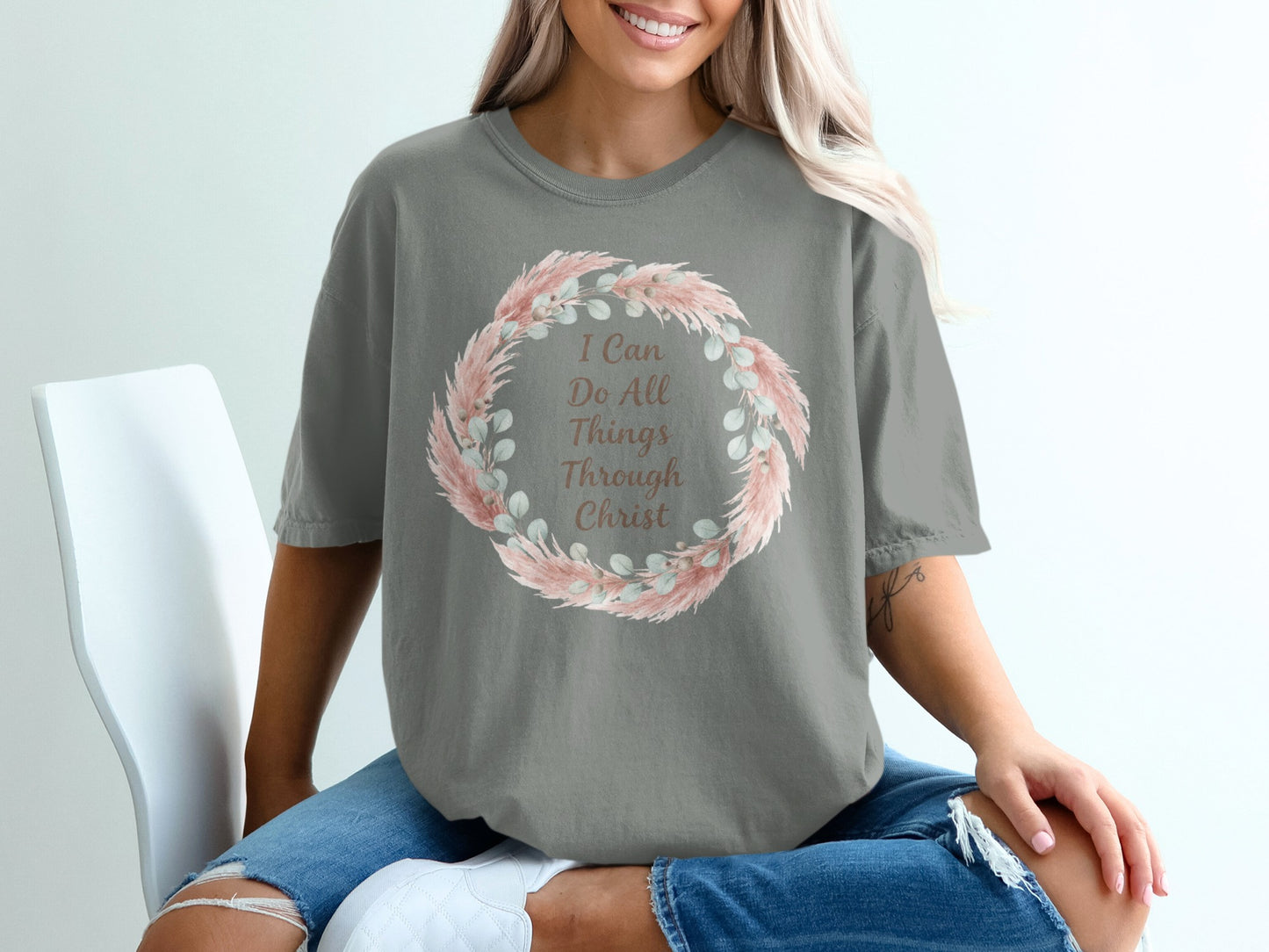 Grey t-shirt with floral wreath and "I Can Do All Things Through Christ" text.