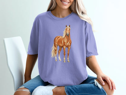 Purple t-shirt with graphic of a brown horse standing.