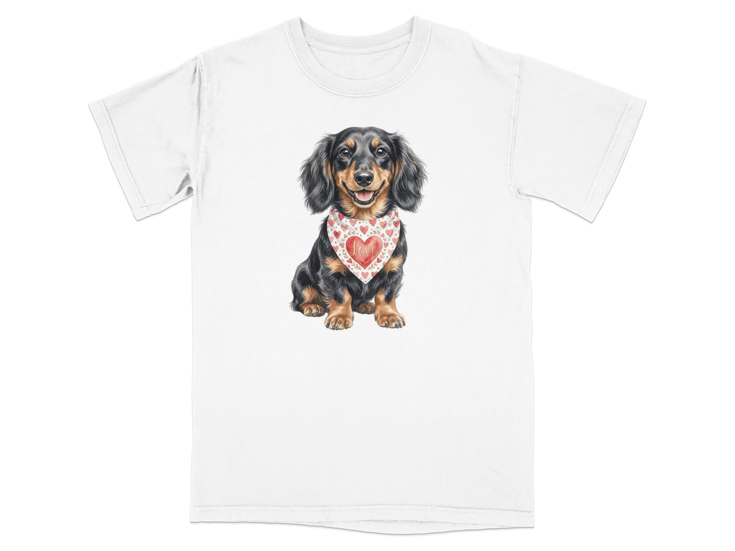 White t-shirt with a watercolor illustration of a dachshund wearing a heart-patterned bandana.