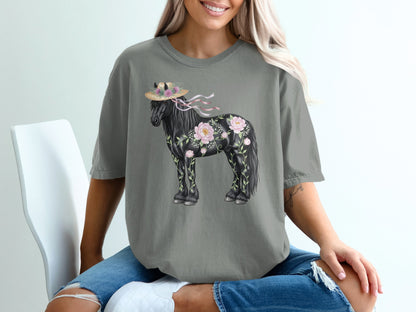 Black horse with floral accents wearing a straw hat on a gray t-shirt.