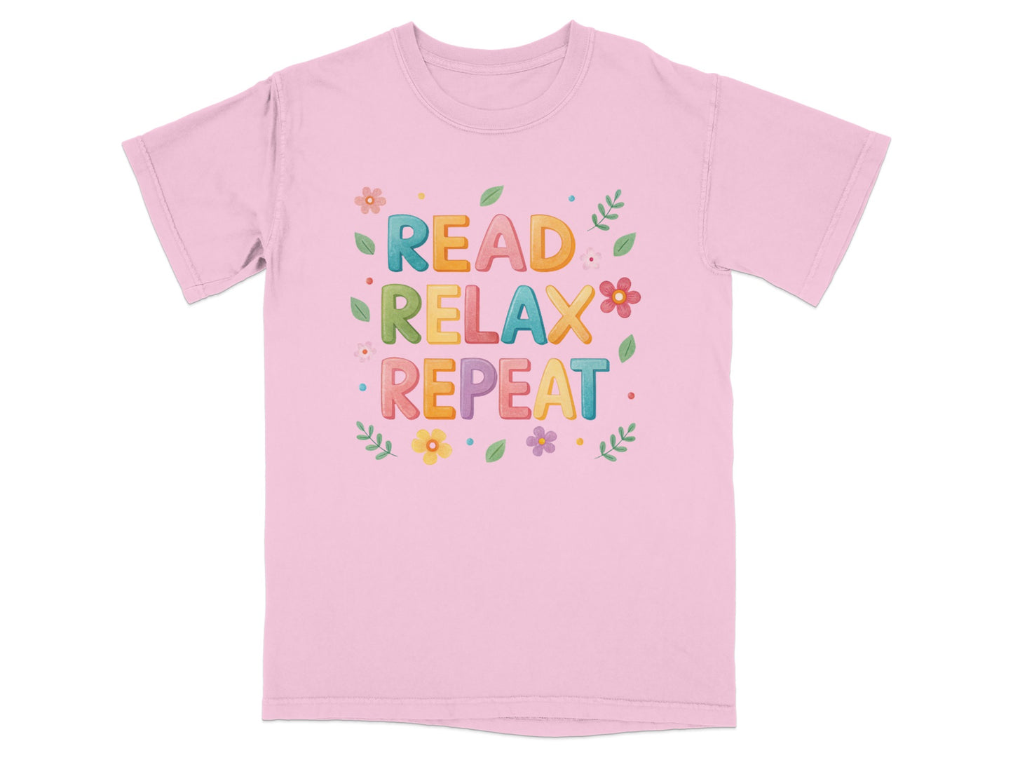 Pink t-shirt with "READ RELAX REPEAT" and floral design.