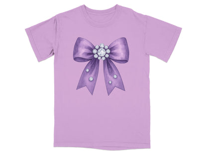 Lavender t-shirt with a watercolor bow adorned with rhinestones.