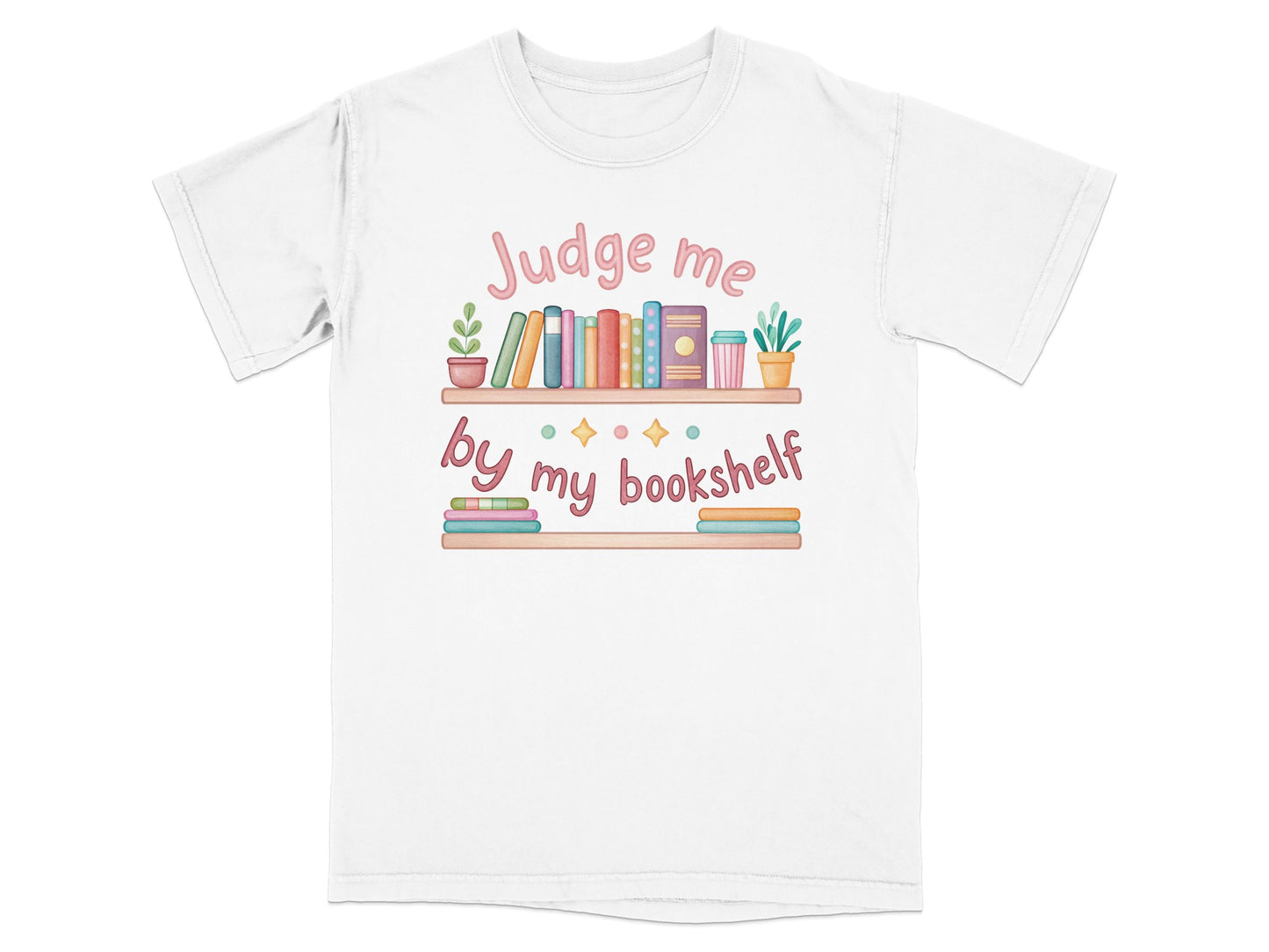White t-shirt with "Judge me by my bookshelf" text and colorful books.