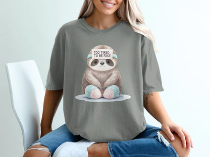 Gray t-shirt with a tired sloth graphic and "TOO TIRED TO BE FAKE" text.